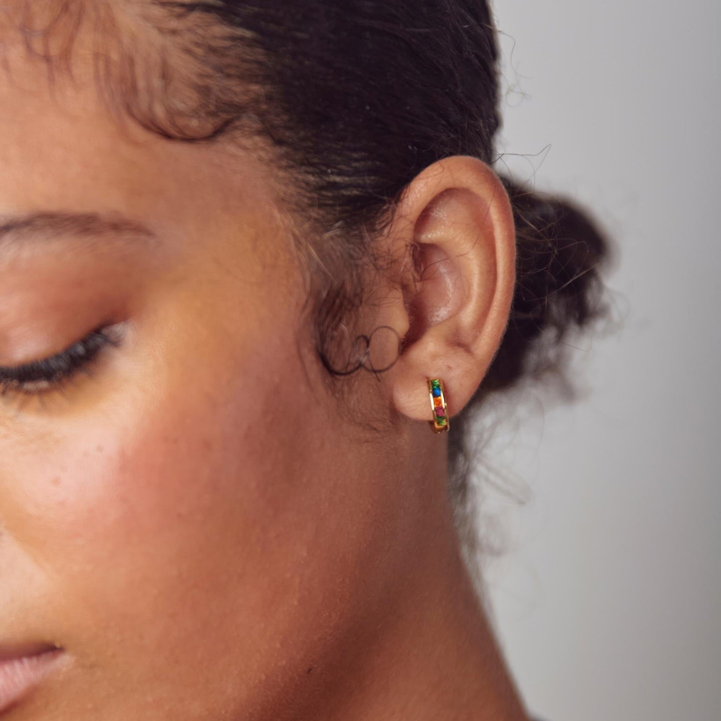 Rainbow huggie hoop earring